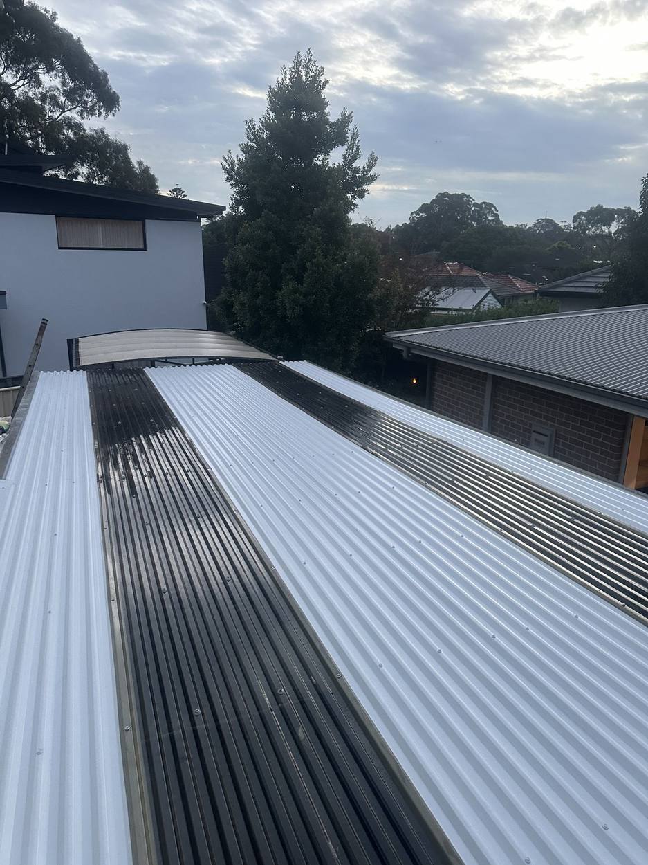 New Colorbond sheeting going on a roof
