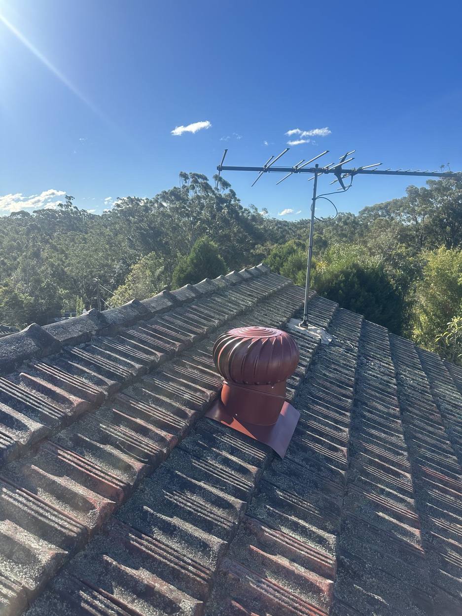Whirlybird vent installed on a tile roof